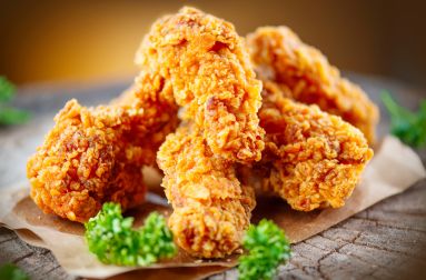 Perfectly fried chicken tenders cooked in a fryer with Frylow in it