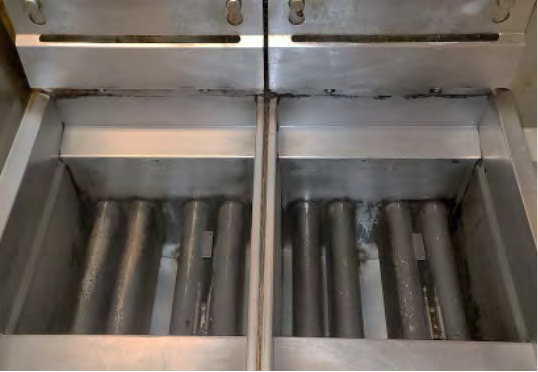 A clean and like-new Deep Fryer after Frylow Cleaning Solution is used on it.