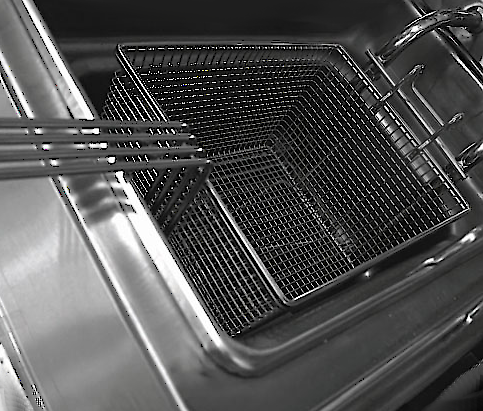 A sparkling clean deep fryer and basket after being cleaned by FCS.